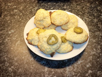 [Some cookies. A few have jalapenos on top.]